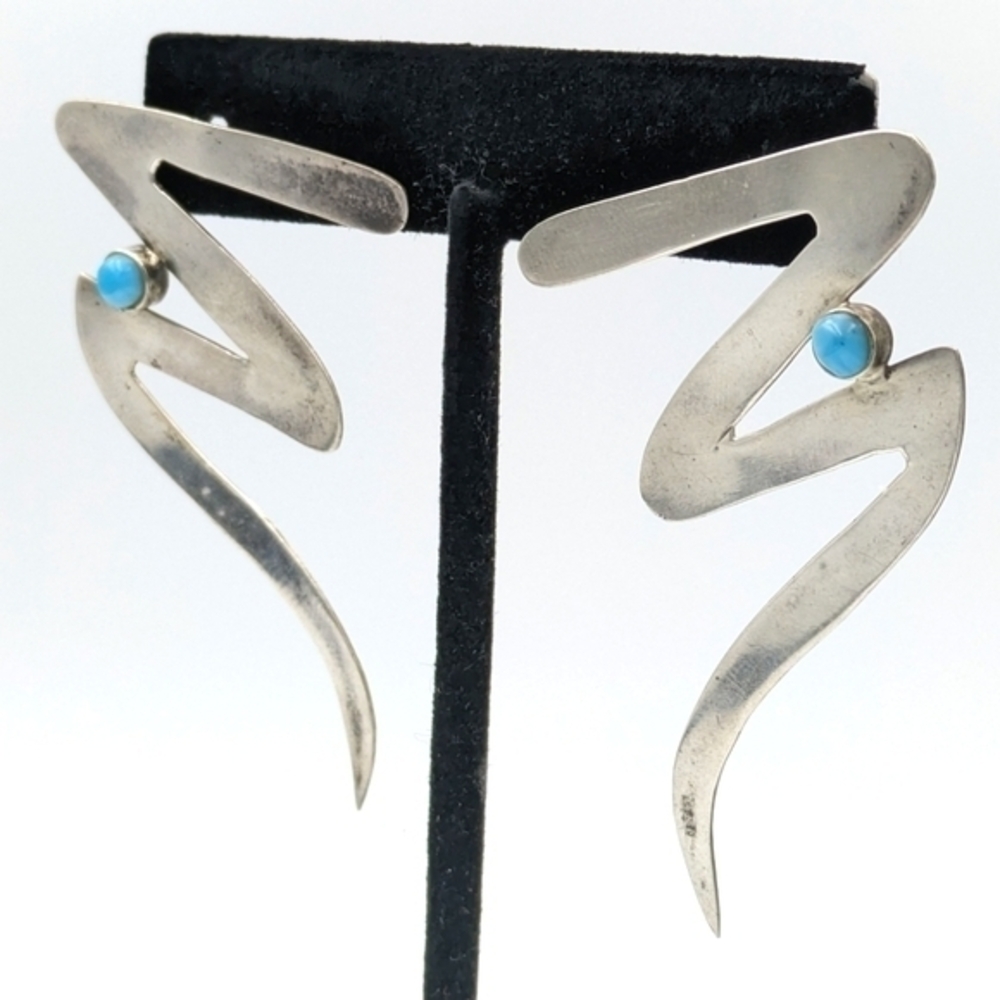 Marked925 sterling silver hand crafted turquoise Navajo sleeping beauty earrings